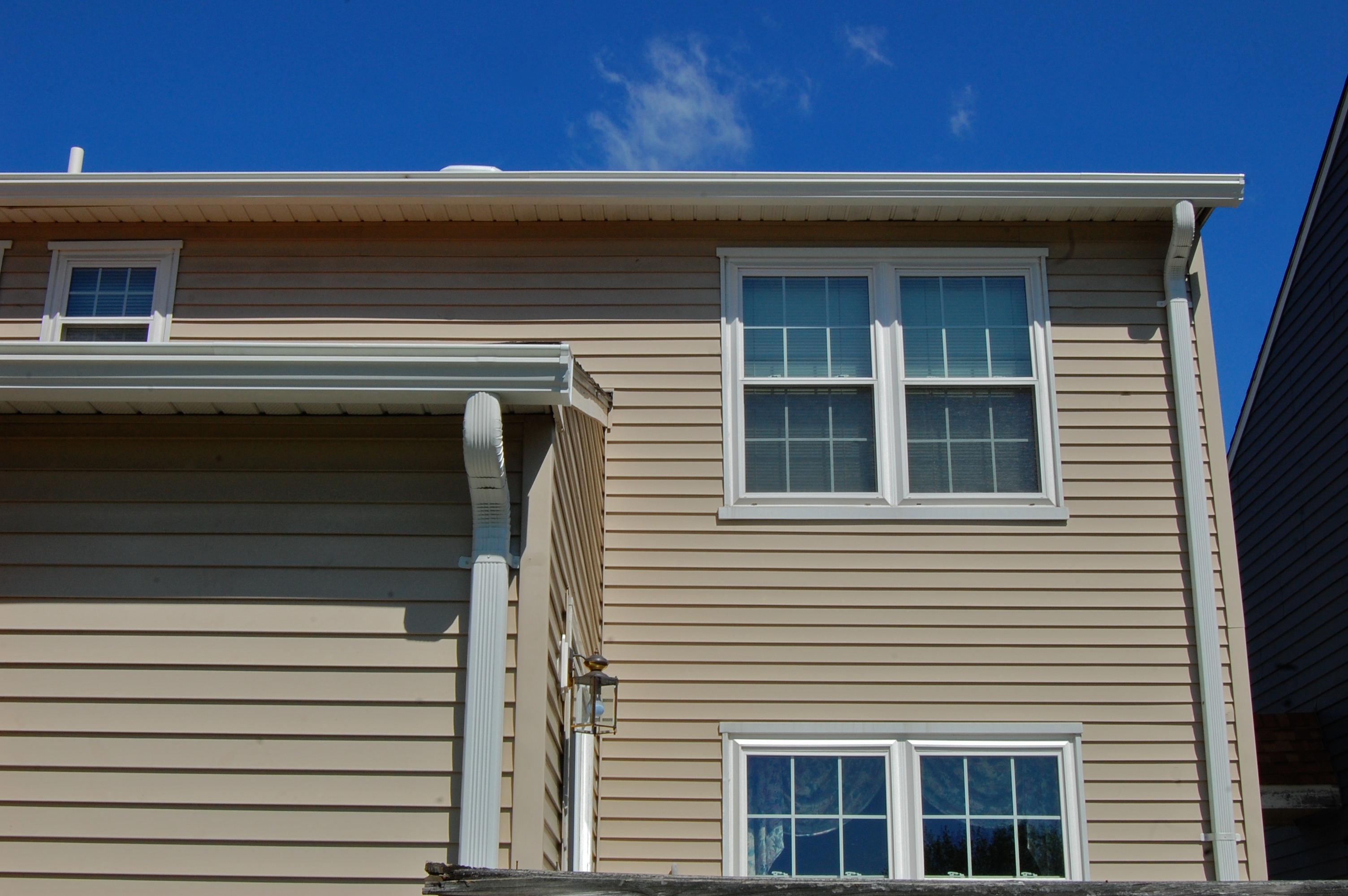 New Gutter With Wide Downspout